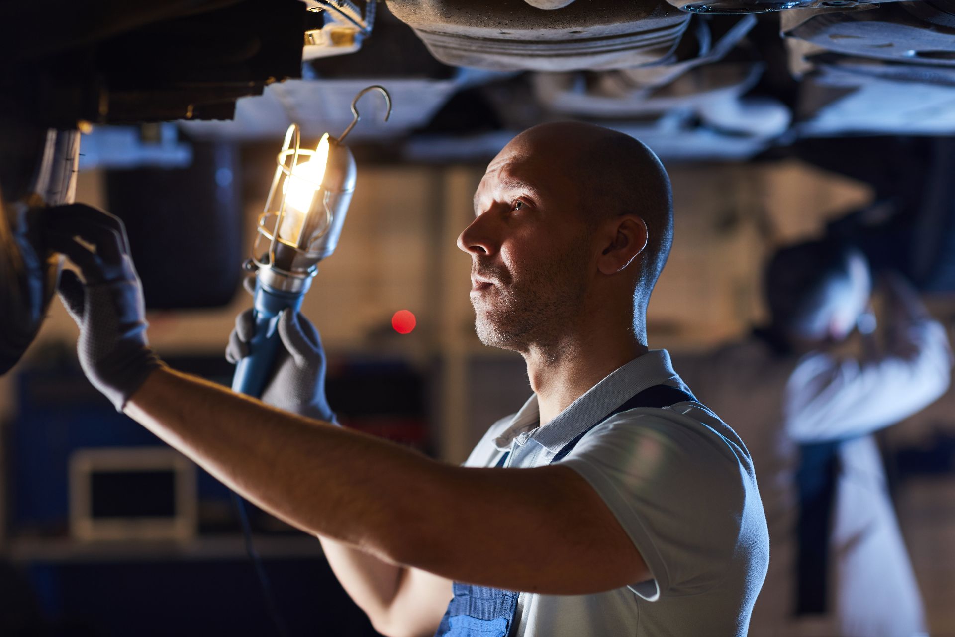 mechanic-fixing-car-2025-03-08-19-05-26-utc.jpg